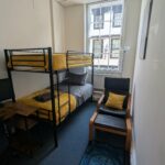 First floor Bunk bedroom 6 with desk, monitor and reading chair