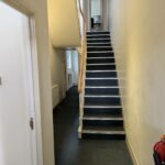 Ground floor staircase to first floor rear bedroom