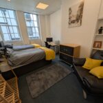 First Floor Front Bedroom Twin Beds with desk, monitor and reading chair