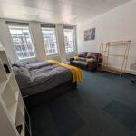 Ground Floor front Bedroom Twin Beds with desk, monitor and reading sofa