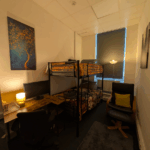 First floor Bunk bedroom 6 with desk, monitor and reading chair